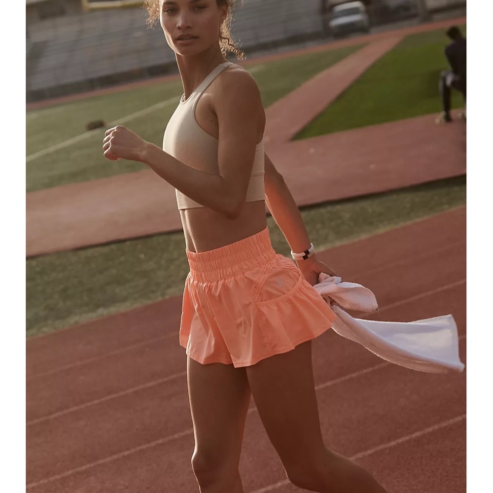 free people get your flirt on shorts. size M. neon orange.